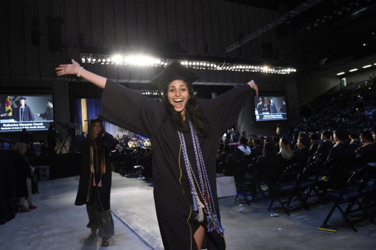 Photo of graduate celebrating