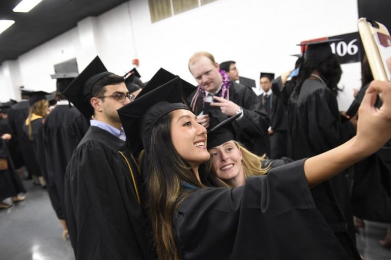 Photo of graduates taking a selfie